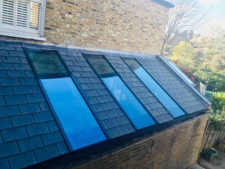 Conservatory roof with glass panels